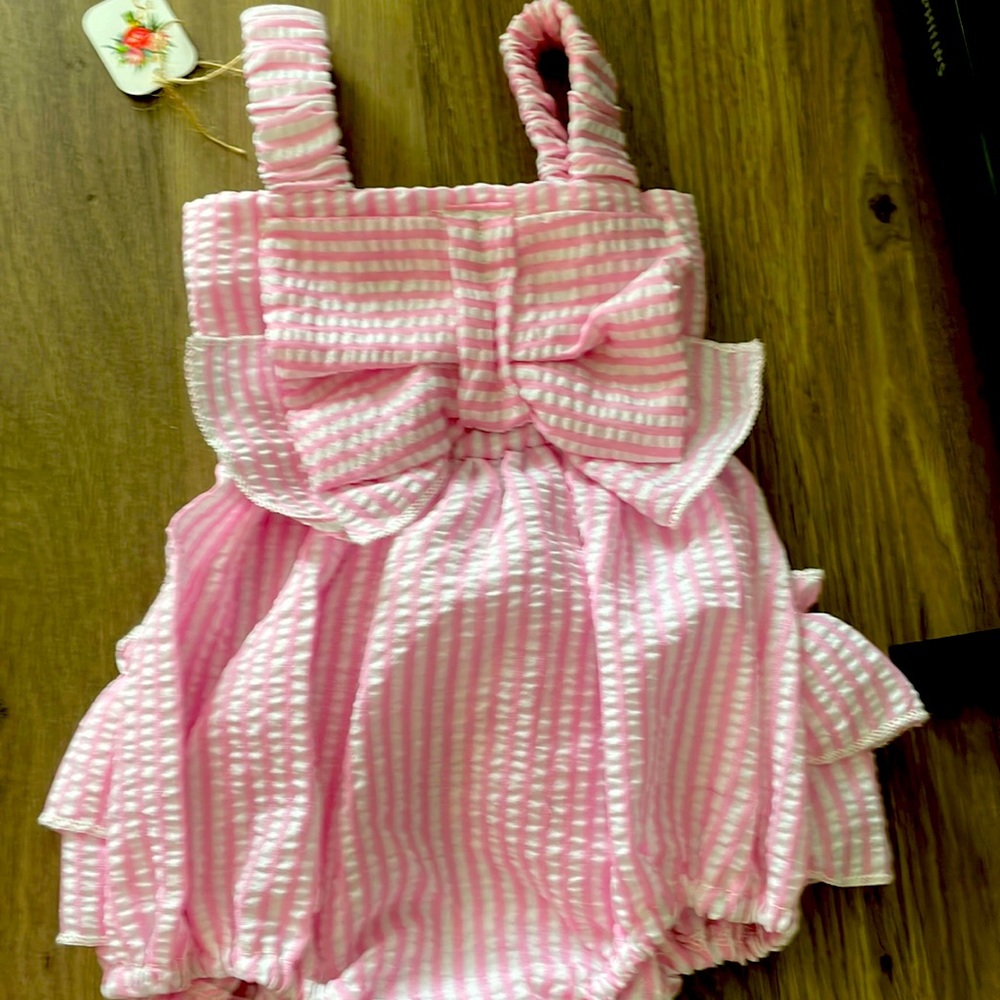 Baby sunsuit size 6 -9 months